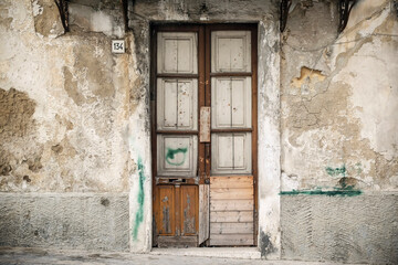 Old door on abandoned building
