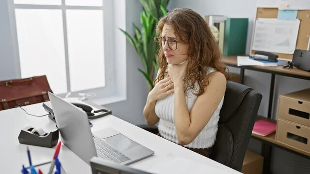 Young, beautiful office woman working through painful suffocate, choke; asphyxiate from strangle. internal health problem screams in silence