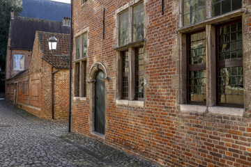 Fototapeta na wymiar Houses and street in Le Beguinage, Leuwen, Belgium
