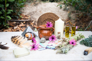 Still life with daisies, feathers, bundles and natural soaps