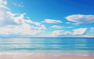 Fototapeta na wymiar Sunny beach with clouds and clear sea