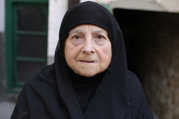 Senior muslim woman close up