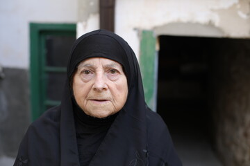 Senior Islamic woman close up