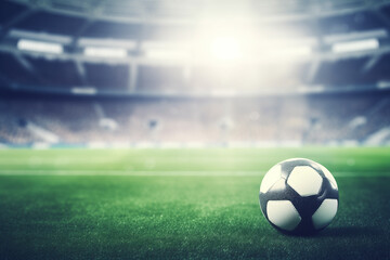 A soccer stadium with a green field and a sky background