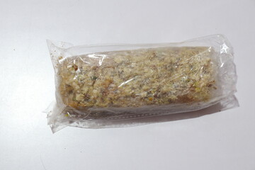Authentic Jaggery Dry Fruits Putharekulu Sweet Isolated on White Background 