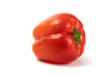 A sweet red bell pepper isolated on white