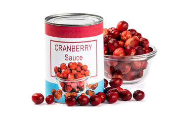 A fake generic labelled food can of cranberry sauce with loose cranberries isolated on white