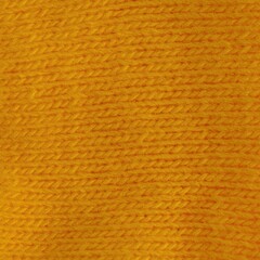 Obraz premium Yellow knitted background. Full frame