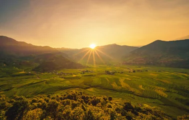 Cercles muraux Mu Cang Chai Aerial top view of paddy rice terraces, green agricultural fields in countryside or rural area of Mu Cang Chai, Yen Bai, mountain hills valley at sunset in Asia, Vietnam. Nature landscape background.