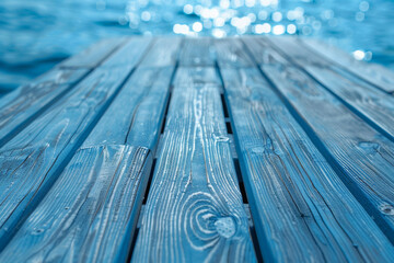 Sunlit Wooden Pier Over Tranquil Blue Waters Close-Up