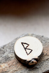 Berkan rune. Wood burning. Rune of feminine strength and fertility