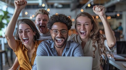 joyful diverse business team celebrates triumph in startup office. successful multiethnic group holds fists up with happiness and excitement