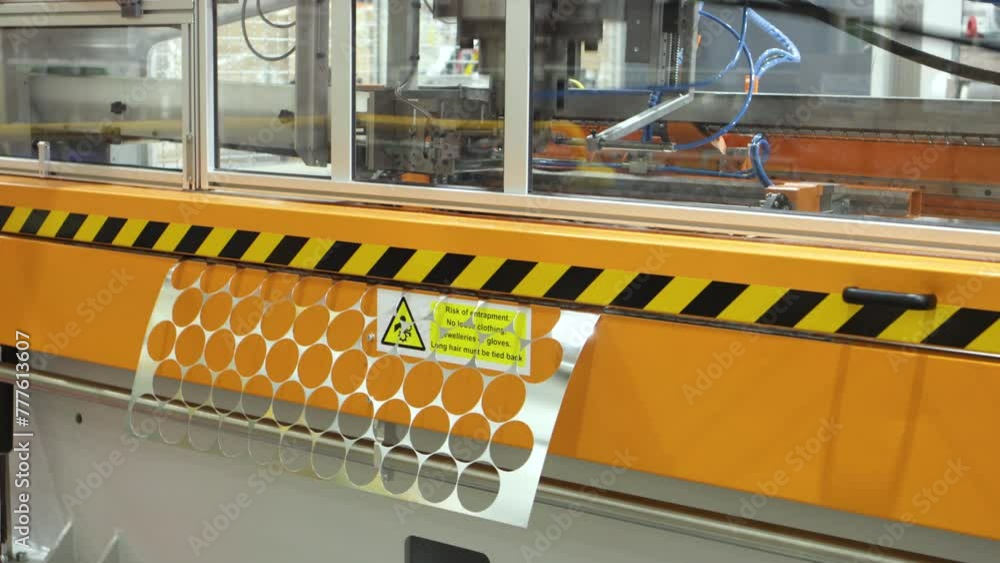 Poster automatic power press robot operating in a factory. automated equipment needed in industry and engin