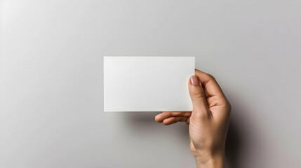 Obraz premium white piece of paper on a gray background