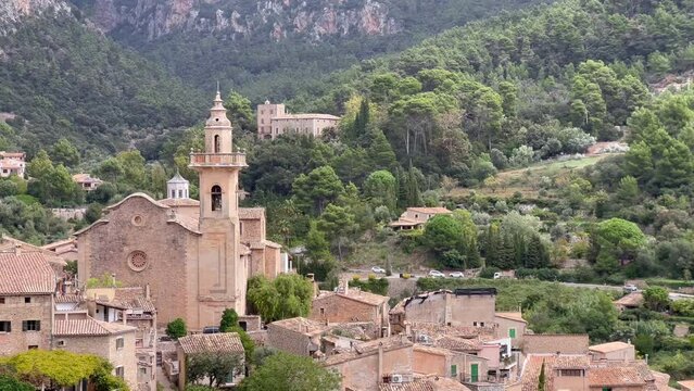 Static shot of stone buildings in the mountain town of Valldemossa, Chopin's town