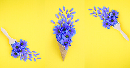 Ice cream cone and paintbrush with blue flowers on the yellow background. Top view. Copy space.
