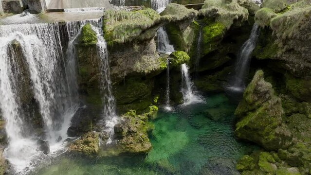 A slow downward panning cinematic close up shot of Traunfall Austria