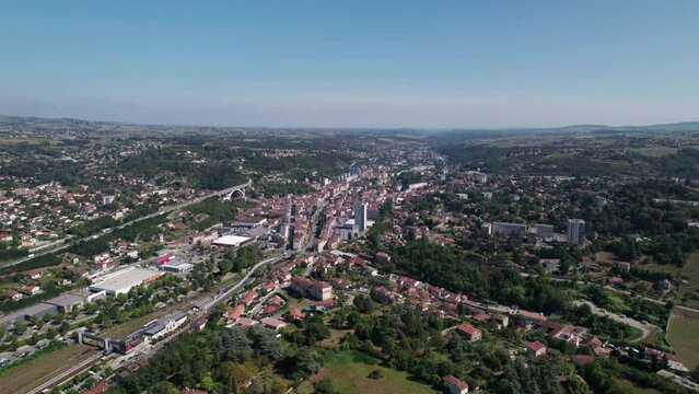 wide aerial shot over gier valley and rive de gier city in loire department on a summer sunny day, auvergne rhone alpes region, france