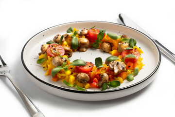 Saffron rice with carrots, tomatoes, corn, mushrooms, cherry tomatoes, sunflower sprouts and black sesame seeds. Served on a simple ceramic plate. Vegan cuisine concept. A hand-taken photo, not AI