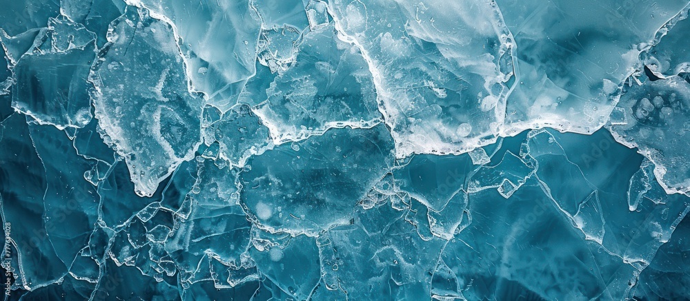 Poster detailed view of ice formations floating on the waters surface, showcasing intricate patterns and te