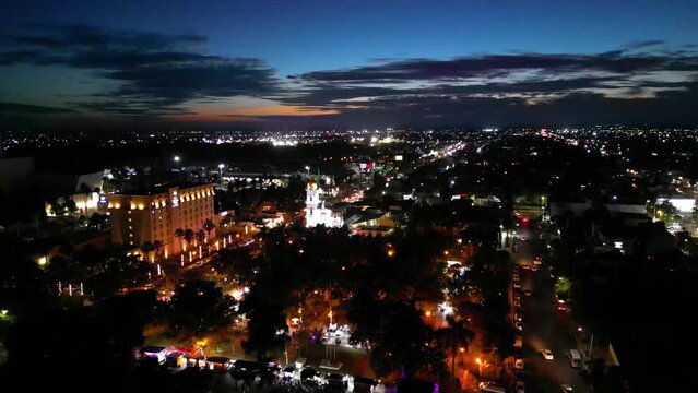 beautiful sunset in the city of los mochis sinaloa in mexico, you can see the church of the Sagrado Corazon de Jesus and the plaza 27 de september