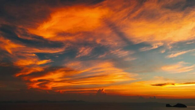 Epic clouds on red-orange sunset light