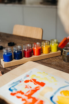 painting jars on a table