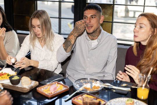 group of friends in a vegan restaurant