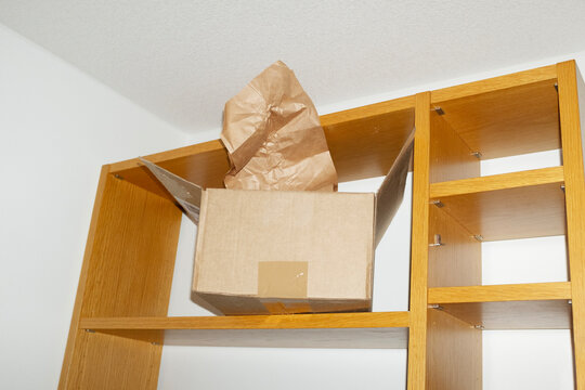 Brown delivery cardboard box & packaging material with hard flashlight