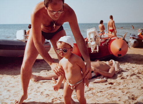 Father and son on the beach