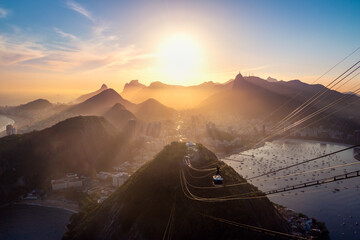Aerial view of Rio de Janeiro at sunset with Urca and Corcovado mountain and Guanabara Bay - Rio de Janeiro, Brazil - obrazy, fototapety, plakaty