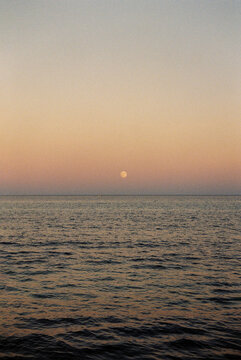 Full moon rising over the sea 