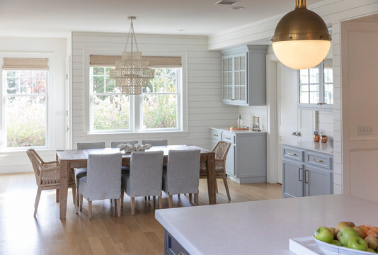 Contemporary table in home dining room light blue