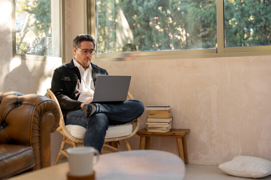 Mature Man Working Remotely