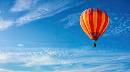 Fototapeta na wymiar hot air balloon soaring high in the endless blue sky!