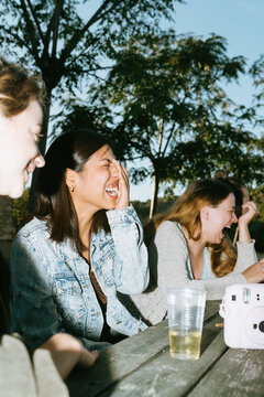 Women Having a Explossive Laugh at the Park