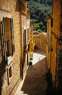 Alley between paving stones houses