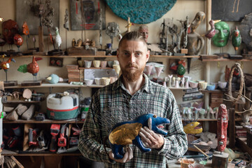 sculpture of a porcupine in hands sculpture