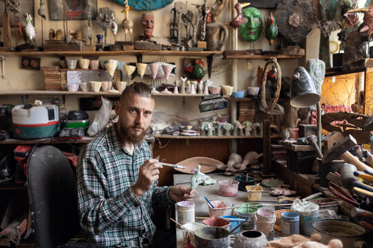 sculptor posing for the camera