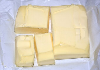 Unpacked a cube of fresh butter ( butter fat content of 83% )