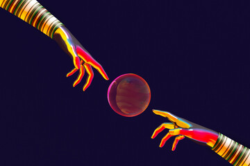 Two hands reaching for a ball with their fingers