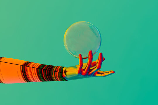 A hand holding a soap ball in front of a green background
