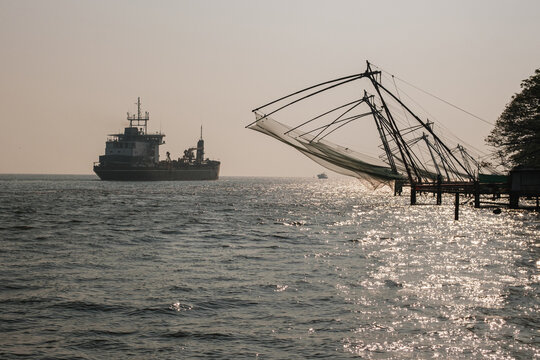 A big ship and fishing nets. 