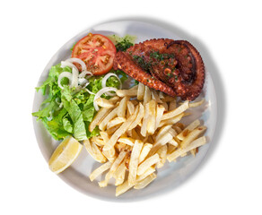 Grilled octopus served with french fries and lemon and salad