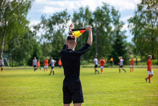 Assistant Soccer Referee Signaling Offside 