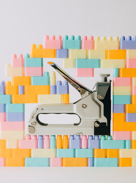 stapel gun and playing bricks