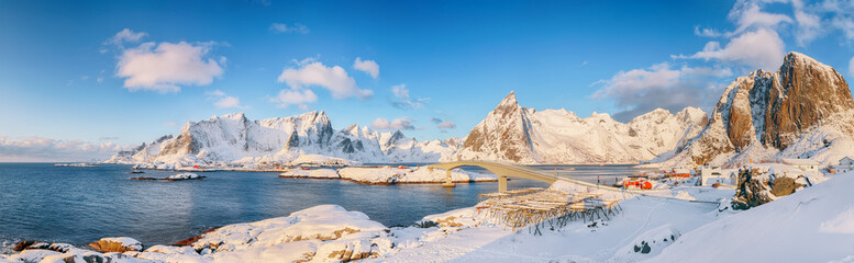 Panoramic winter view on  Reine, Sakrisoya and Hamnoy villages  and bridge to Olenilsoya island .