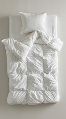 A soft white blanket on white backdrop. Hypoallergenic duvet for year-round comfort.