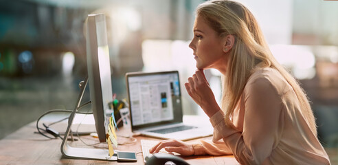 Office, thinking and woman at computer for research, ideas and checking article for online report....