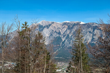 Panoramic view of majestic mountain peak Dobratsch seen from Dreilaendereck (Pec, Often, Monte Forno) in untamed Karawanks, Carinthia, Austria. Alpine landscape in spring in Austrian Alps. Wanderlust